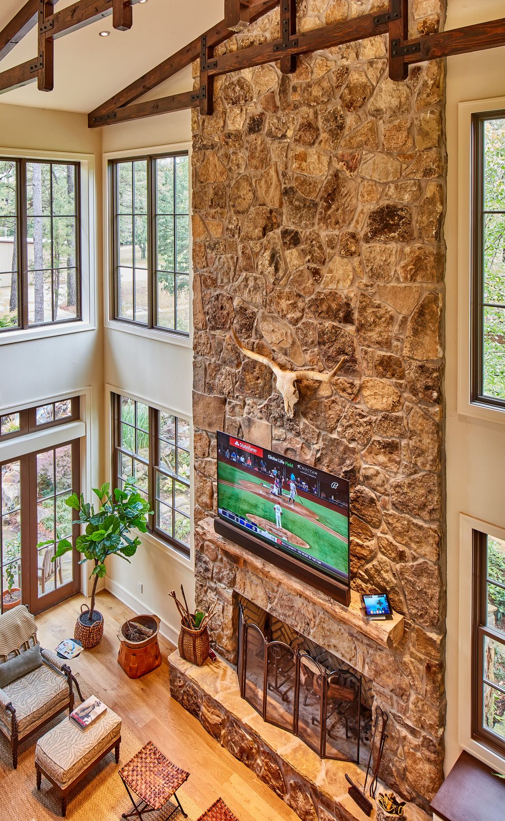 Television mounted above a fireplace, installed by Avevo Technologies