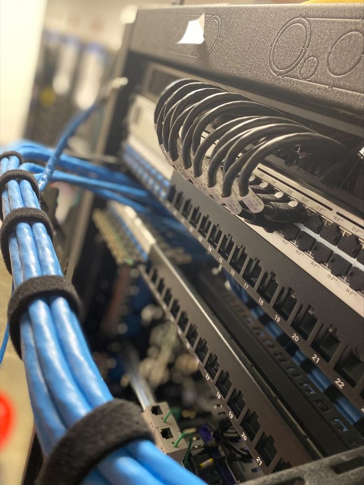 Close-up of equipment rack cabling and network switch