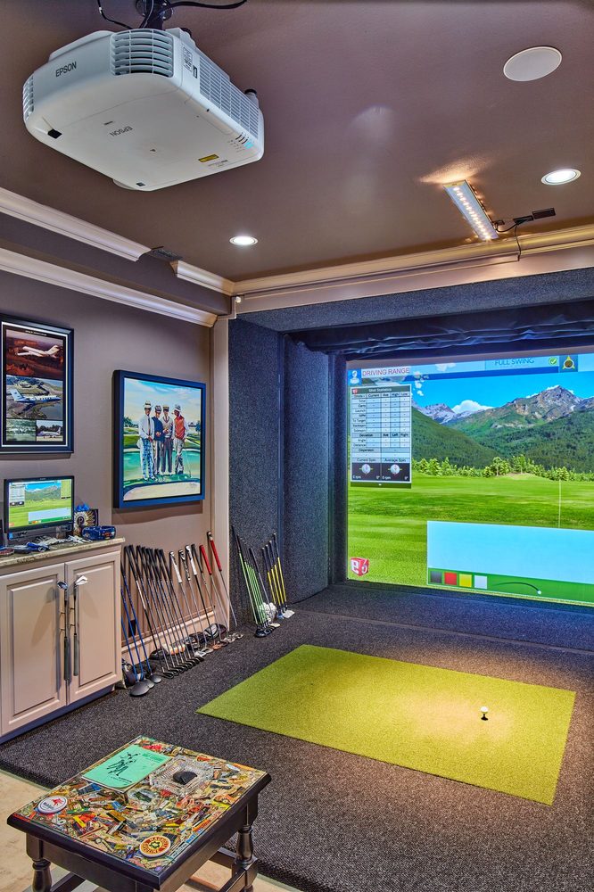 Media room with golf simulator and projector